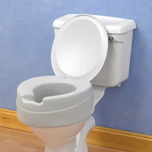 Foam raised toilet seat with a lid, fitted on top of a standard toilet pan